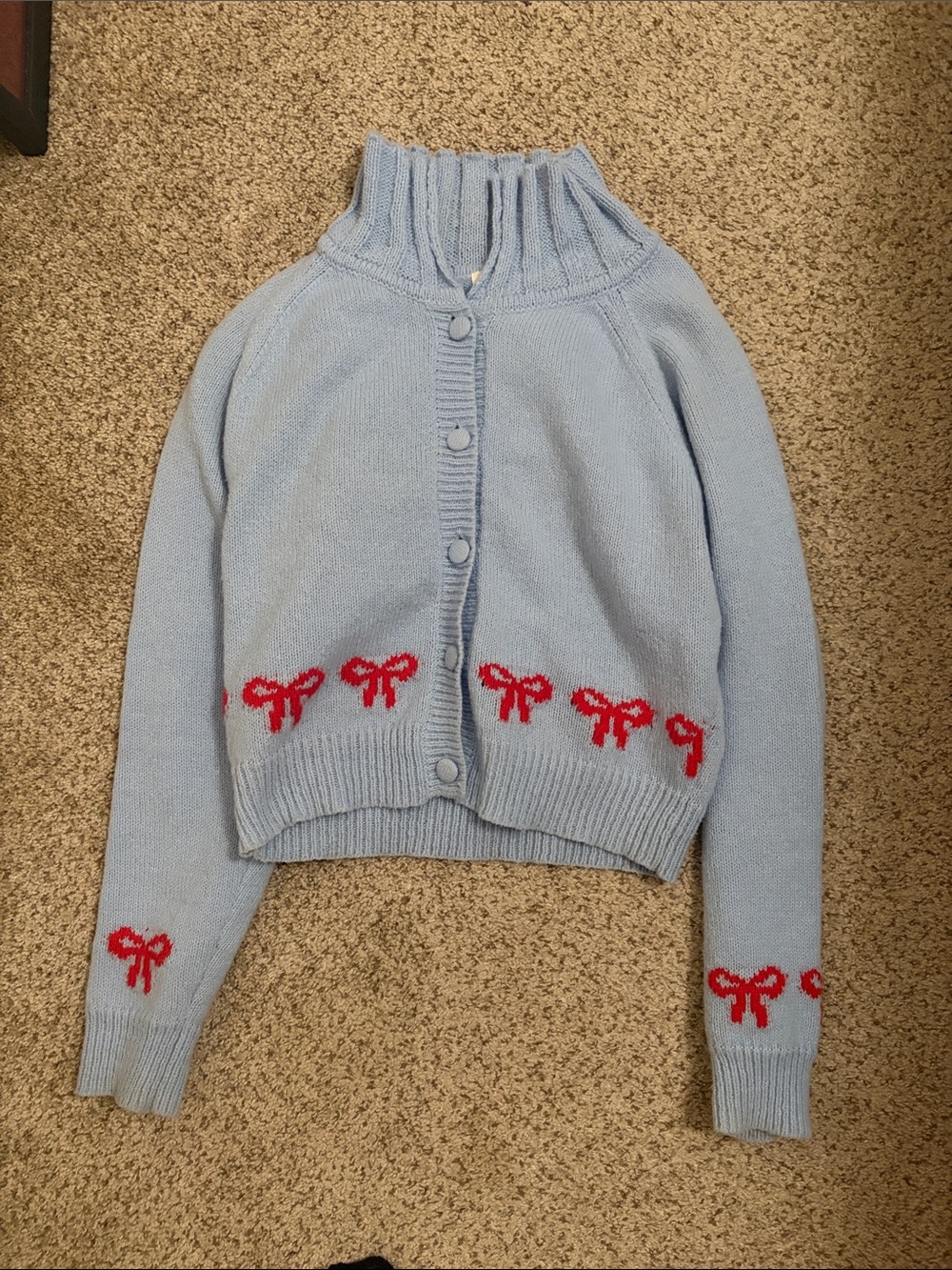 Light Blue Knit Cardigan with Red Bow Accents